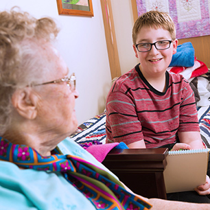 Nursing home resident enjoying conversation